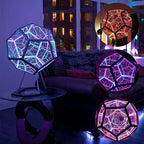 The infinity prism on a glass side table in a living room at night, with close-ups in red and violet