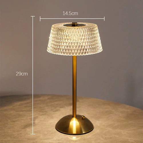 The dome lamp lit on a stone table, shade 14.5 cm across, 29 cm tall