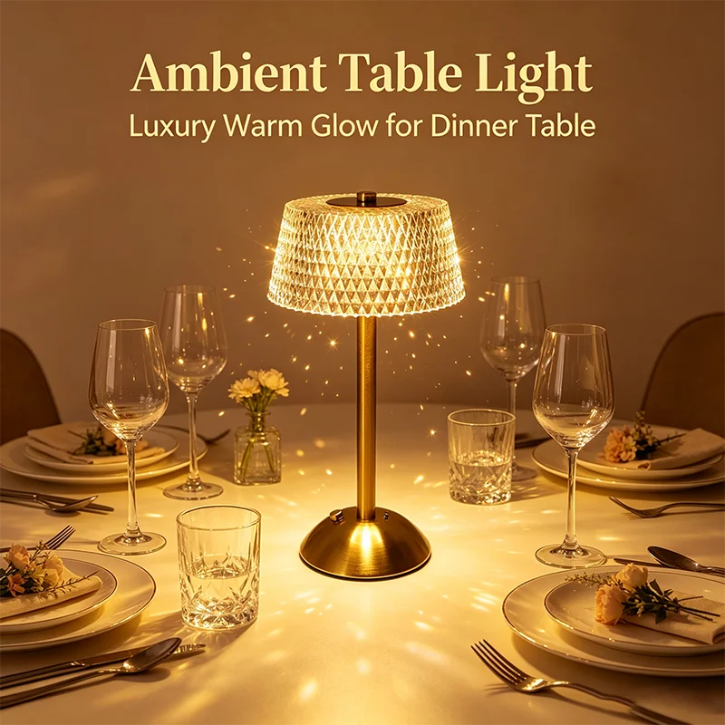 Dome lamp lit on a dinner table set with glasses and plates