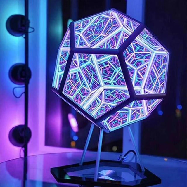 Twelve-sided infinity mirror lamp lit purple and blue on its metal stand