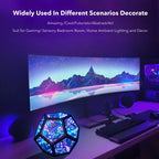 The prism lit blue on a desk in front of a curved monitor