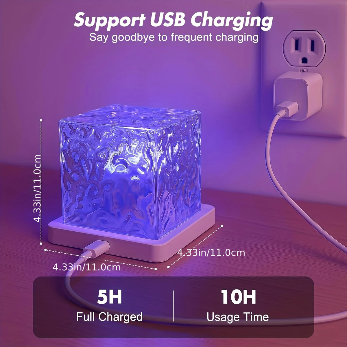 The cube plugged in to charge, 11 cm on each side, marked 5 h charge and 10 h use