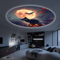 A round moonlit scene of a black cat on a carved pumpkin, projected on a living room ceiling by the small gooseneck lamp