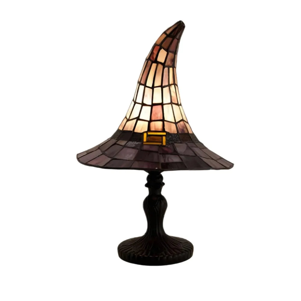 Witch hat lamp lit, on a white background